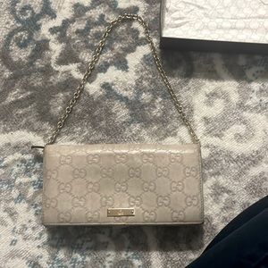 Authentic Gucci wallet on a short chain